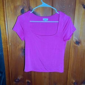 This pink t-shirt has only been worn once
